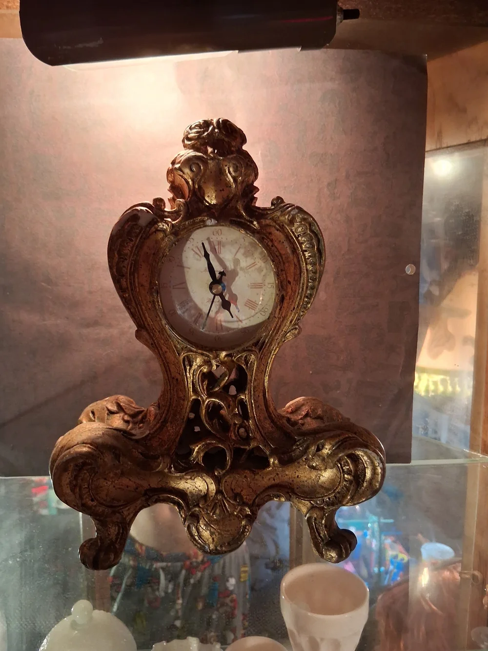 Richard Ward Baroque Style mantel clock, often crafted from cast resin or metal